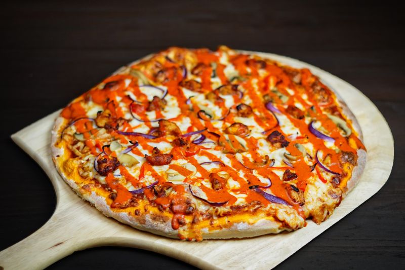 Spicy Buffalo Ranch pizza with hot sauce and blue cheese