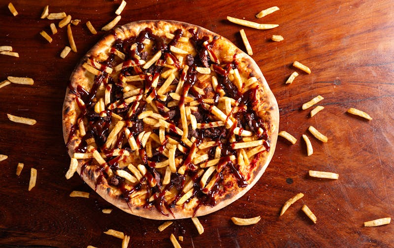 Smoky Ranch Brisket pizza with slow-cooked beef and ranch drizzle