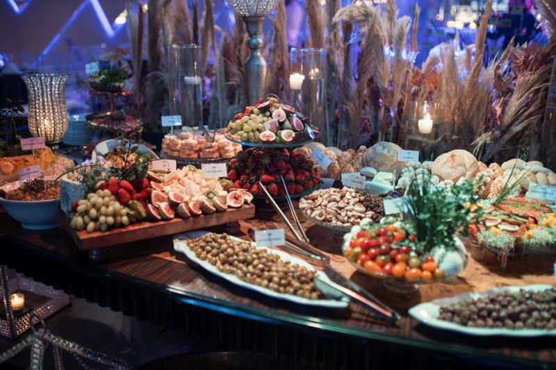 Elegant catering table with Pizza Ranch items