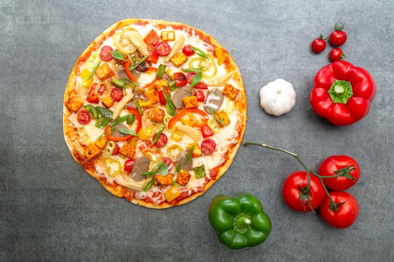 Vegetarian pizza with fresh vegetables